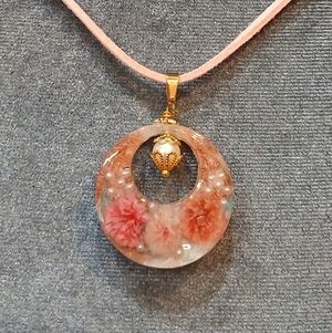 Gold-Accented Pink Resin Pendant Necklace